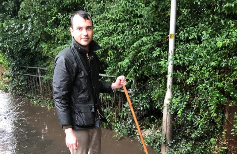 Lewis helping out during flooding