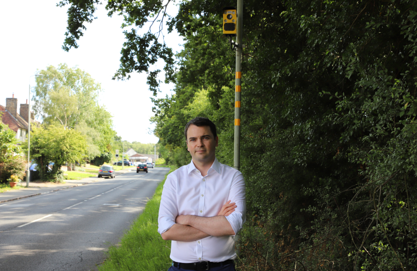 Lewis next to a speed camera