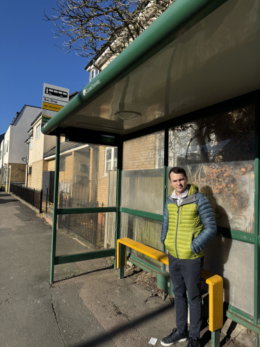 Lewis at a bus stop in Goffs Oak